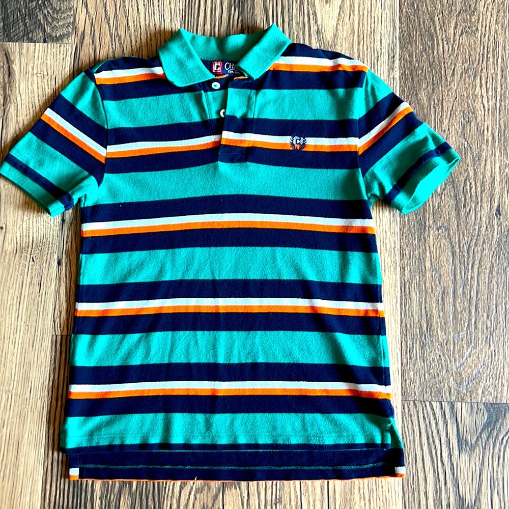 Chaps Boys short sleeves polo shirt with green, blue, orange and white stripes.
